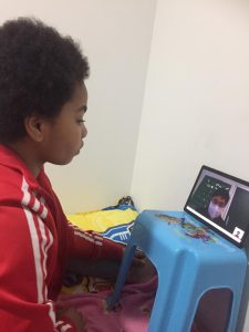 The school provides free computers and mobile data devices for families with poor financial capacity by applying for different external resources.